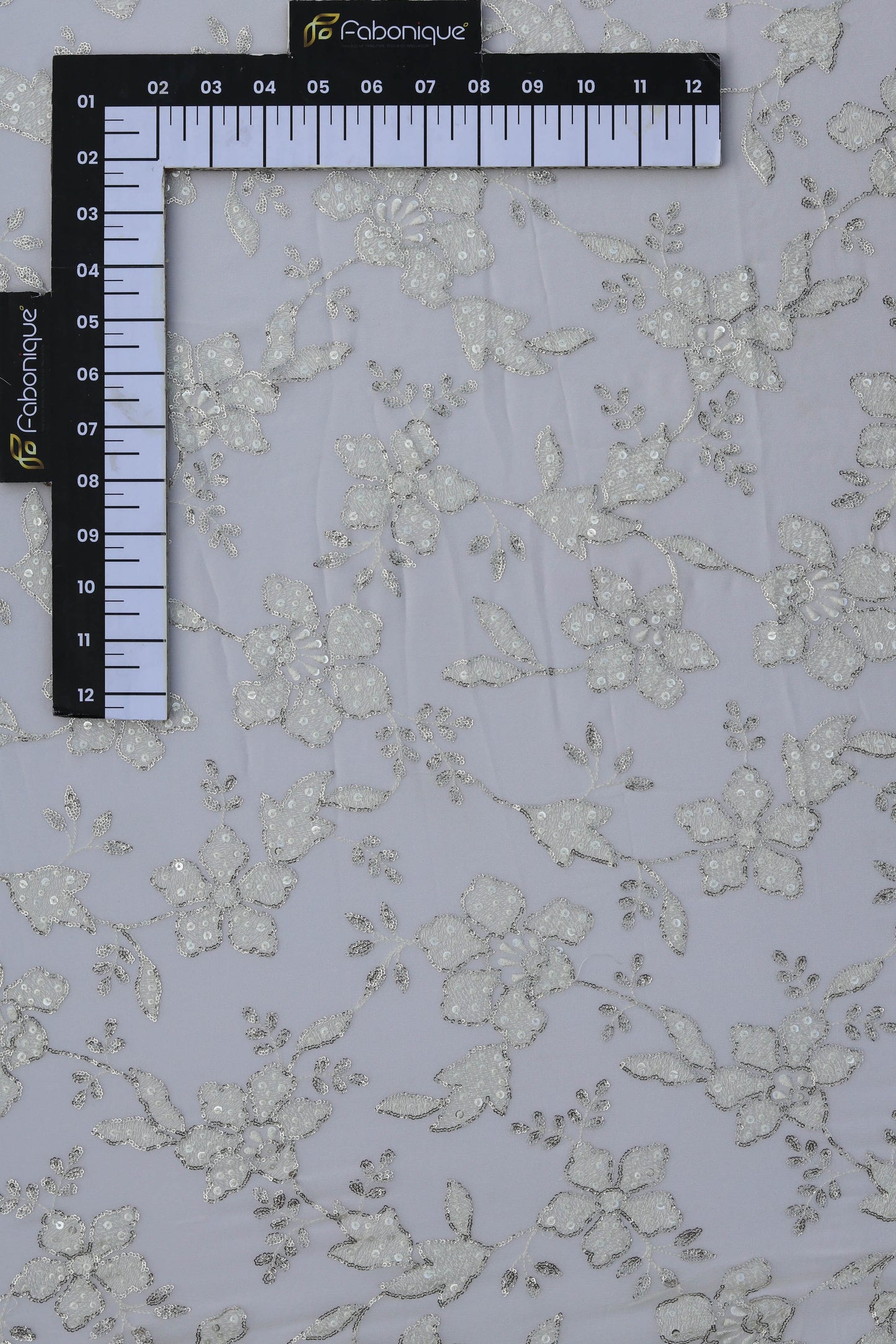 White Floral Embroidered Fabric with Silver Sequin Detailing