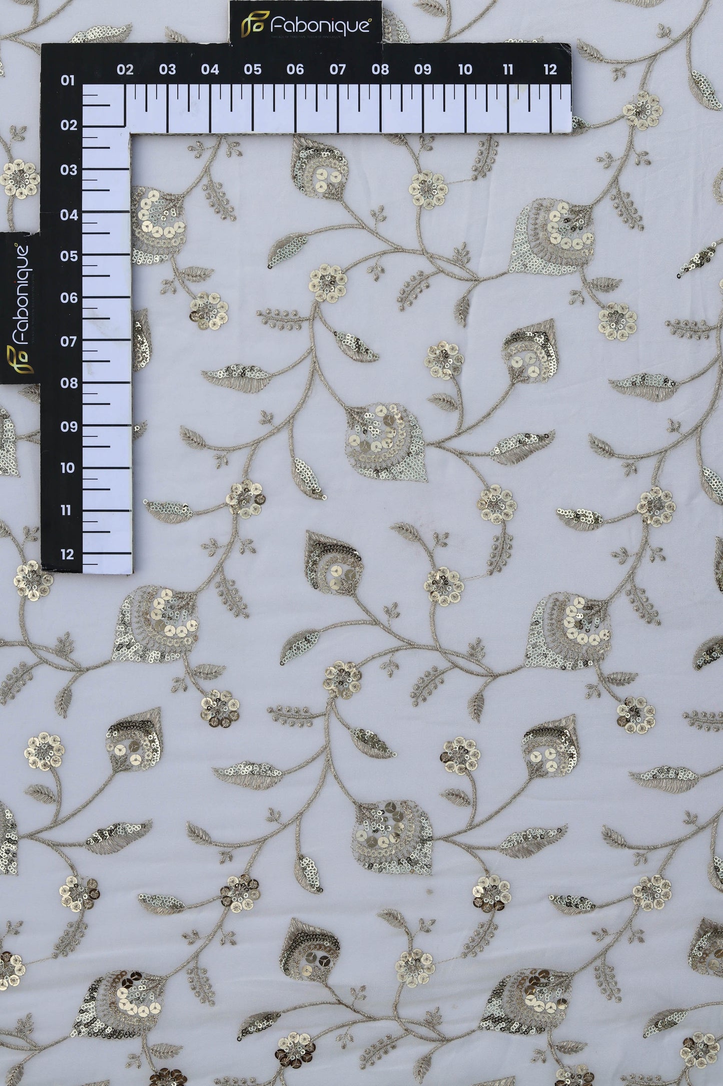 White Floral Embroidered Fabric with Gold Sequin Detailing