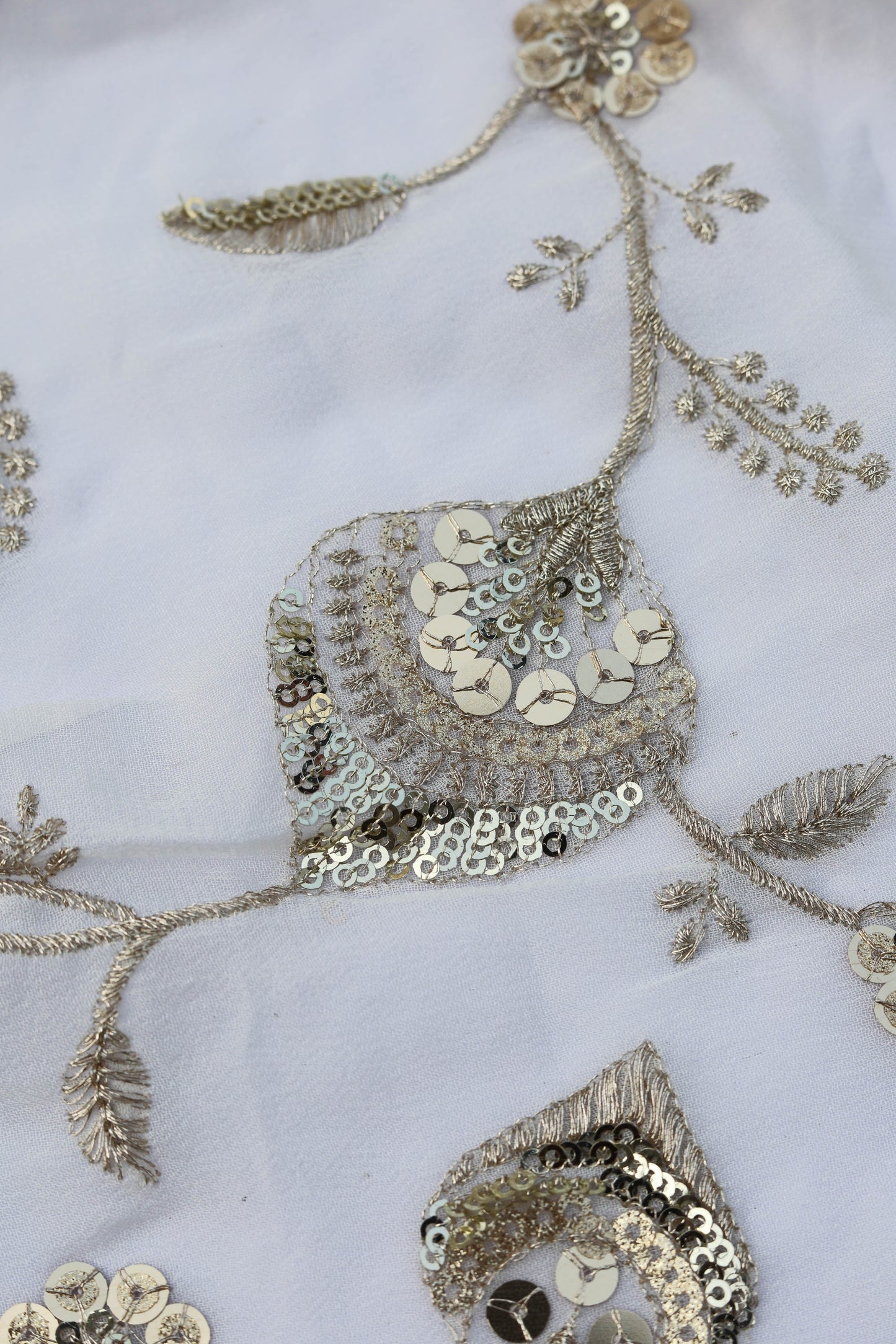 White Floral Embroidered Fabric with Gold Sequin Detailing