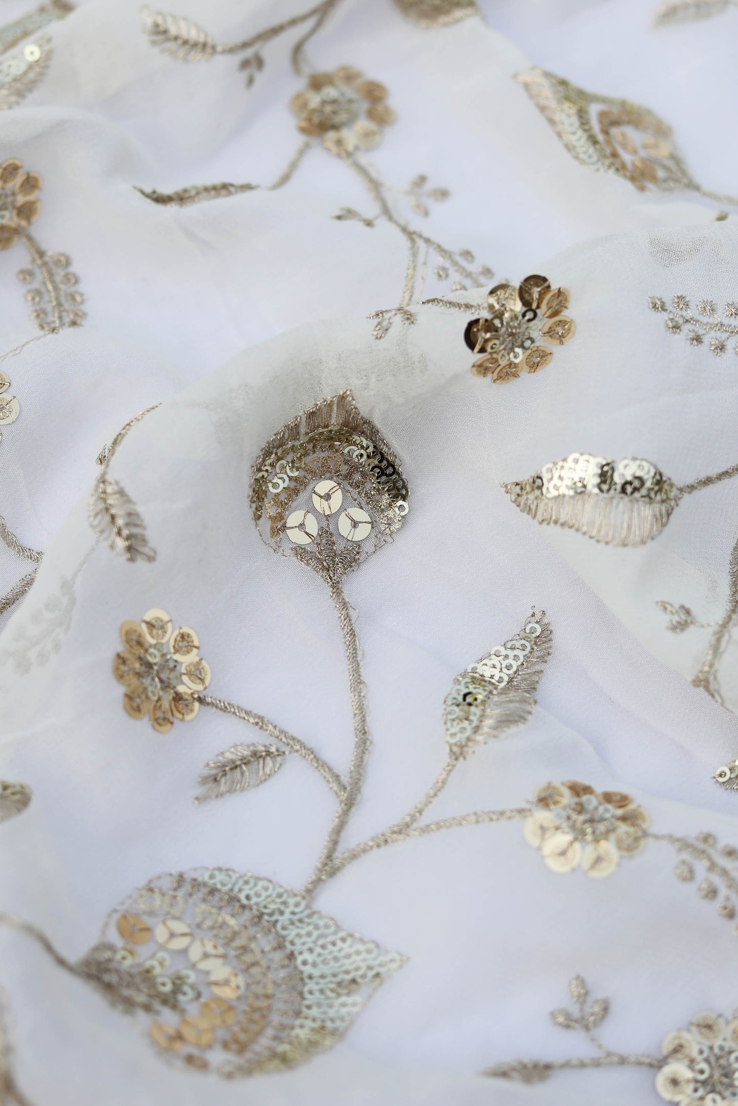 White Floral Embroidered Fabric with Gold Sequin Detailing