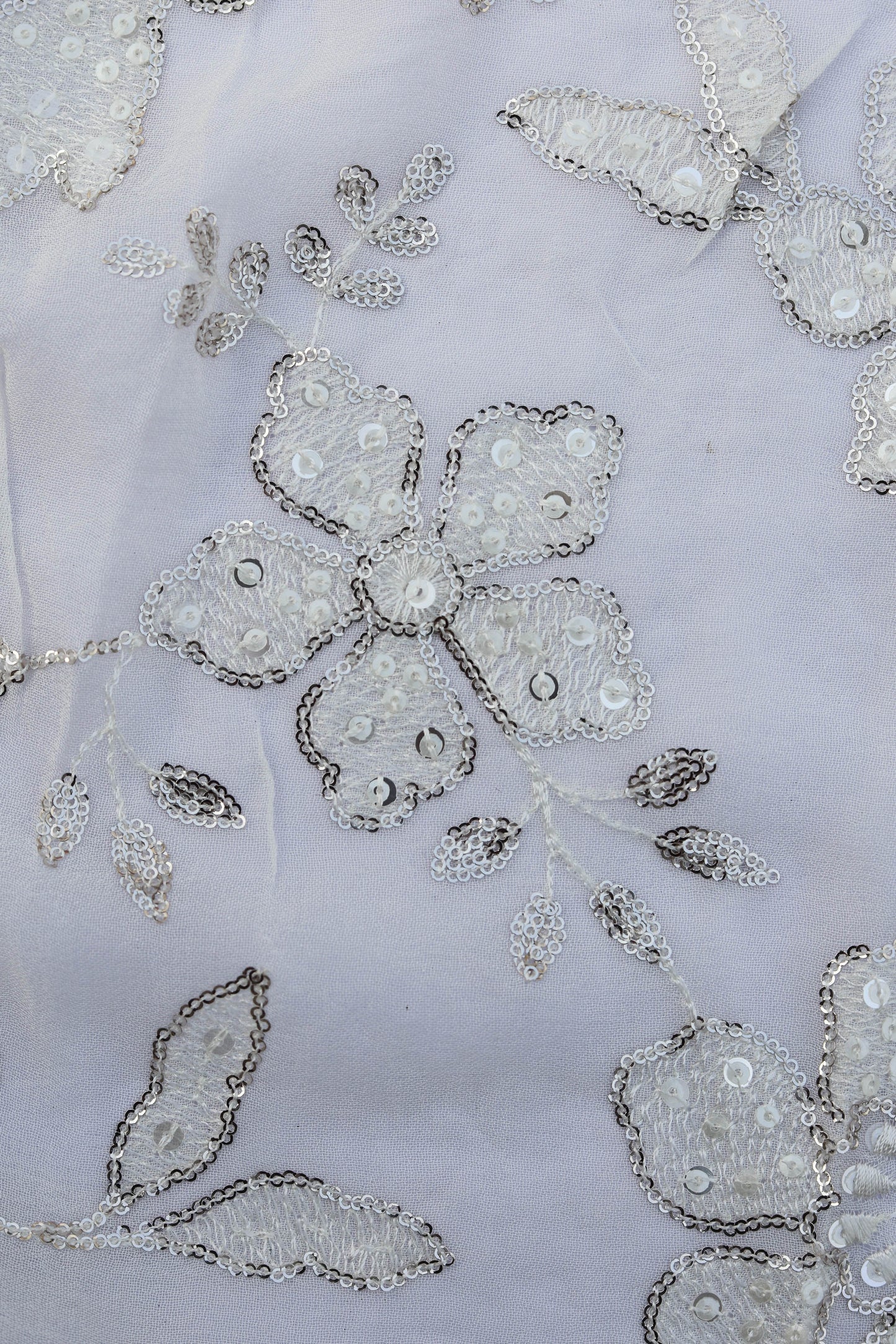 White Floral Embroidered Fabric with Silver Sequin Detailing